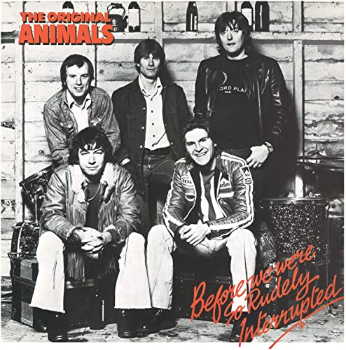 Black and white photo of four men in leather jackets on a CD cover.