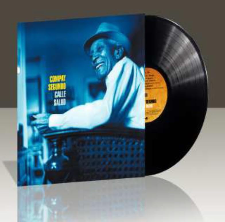Compay Segundo album cover and vinyl record with yellow label.