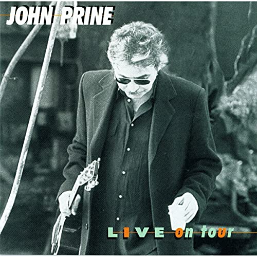 John Prine album cover: portrait of a man with a guitar.