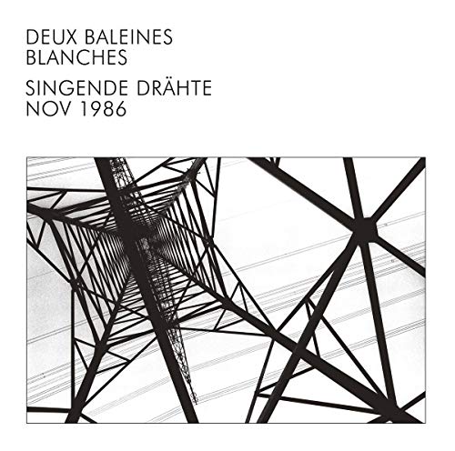 Black and white album cover featuring a tall, angled metal structure.
