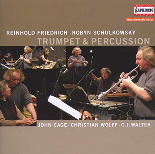 CD cover featuring musicians playing trumpet and percussion in a studio.