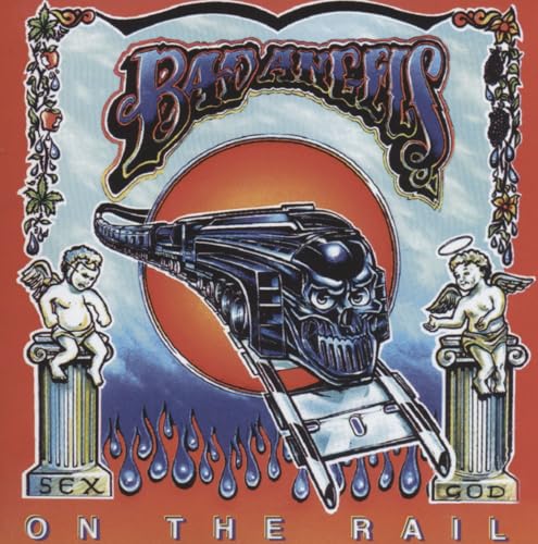 CD cover: skull-shaped train with angels, fruit, and dripping text.