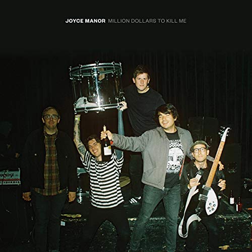 Joyce Manor band photo with instruments and bottles, album cover.