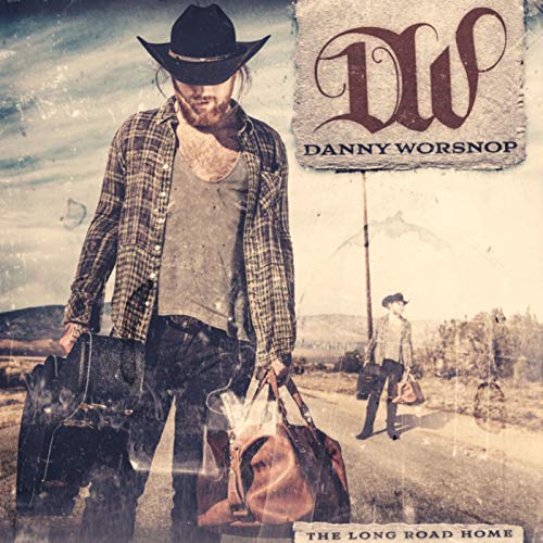 CD cover featuring Danny Worsnop with luggage on a rural road.