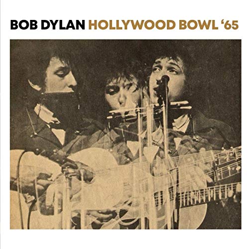 Bob Dylan performing with a band at the Hollywood Bowl, 1965.