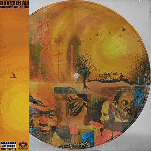 Translucent yellow vinyl record with collage artwork of landscapes and portraits.