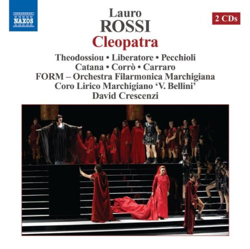 CD cover for opera "Cleopatra" featuring performers in red costumes onstage.