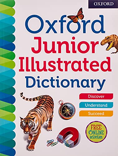 Front cover of the Oxford Junior Illustrated Dictionary with a tiger, butterfly, and compass.