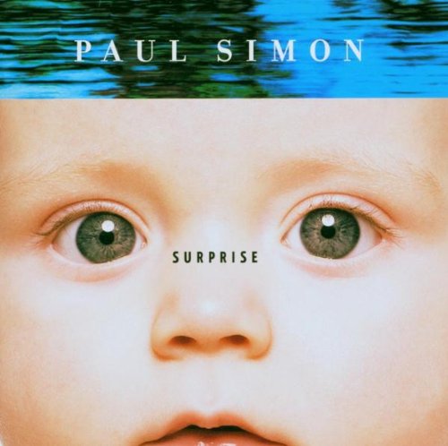Paul Simon’s “Surprise” CD cover: baby’s face with large eyes.