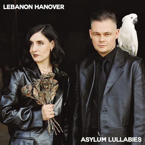 Lebanon Hanover album cover featuring a couple and a white parrot.