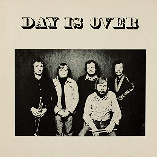Black and white album cover featuring a group of four men with instruments.