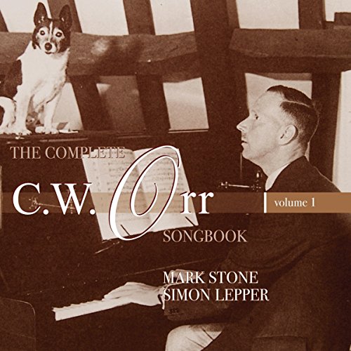 Vintage photo of a man at a piano with a dog, CD cover art.