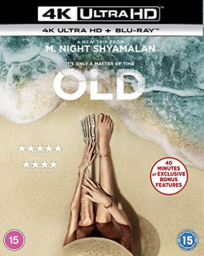 Old" Blu-ray cover featuring aged hands reaching upwards on a beach.