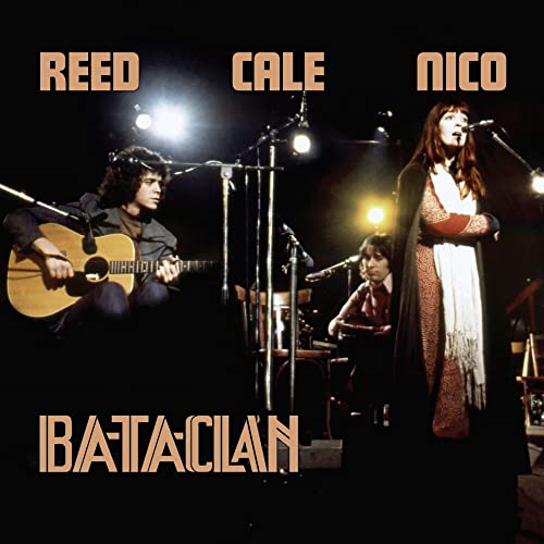 Lou Reed, Nico, and John Cale performing on stage in 1972.