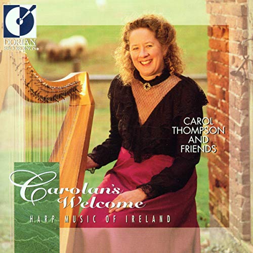 CD cover: Carol Thompson with a harp, smiling in a doorway.