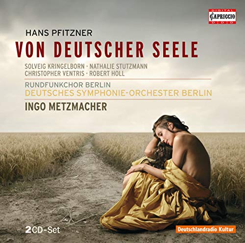 CD cover: woman in gold fabric seated in a wheat field.