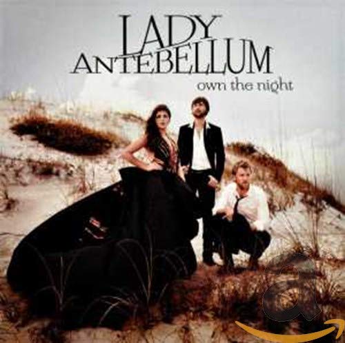 Lady Antebellum “Own the Night” CD cover with band members in a landscape.