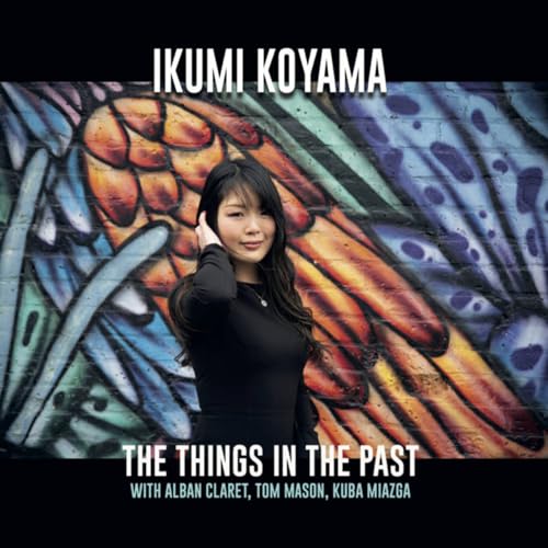 CD cover featuring Ikumi Koyama posing in front of a colorful mural.