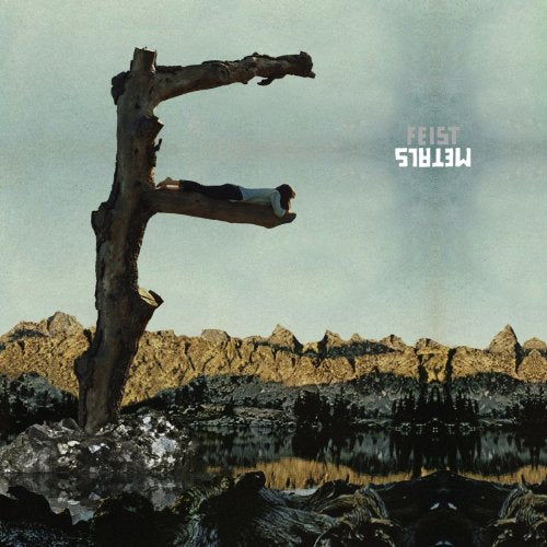 Album cover for Feist’s “Metals” featuring a person on a tree branch.