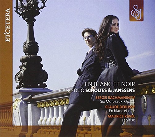 CD cover featuring a piano duo posing near a wrought iron railing.