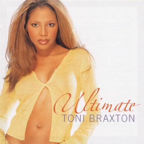 Toni Braxton album cover, close-up portrait, light yellow background.