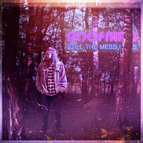 CD cover: man in plaid jacket stands in a blurred forest.