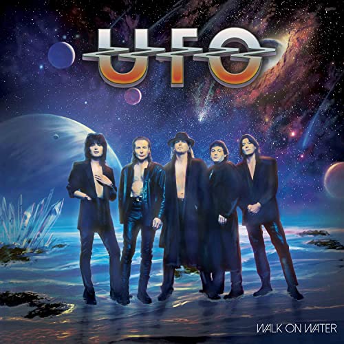 UFO band members in front of a cosmic, watery landscape.