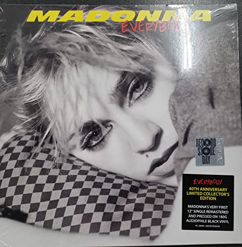 Black and white portrait of Madonna on a checkered pillow, 12-inch vinyl cover.