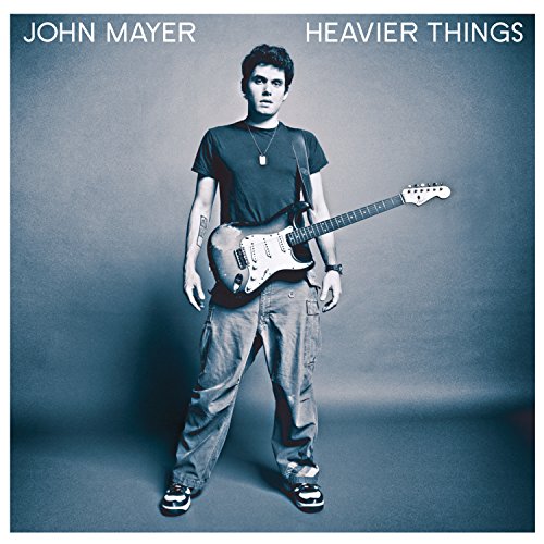 John Mayer album cover, “Heavier Things,” featuring Mayer with a guitar.