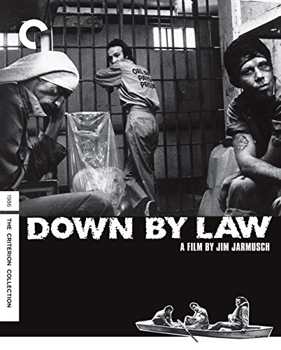 Black and white film cover showing three men in a prison cell and boat.
