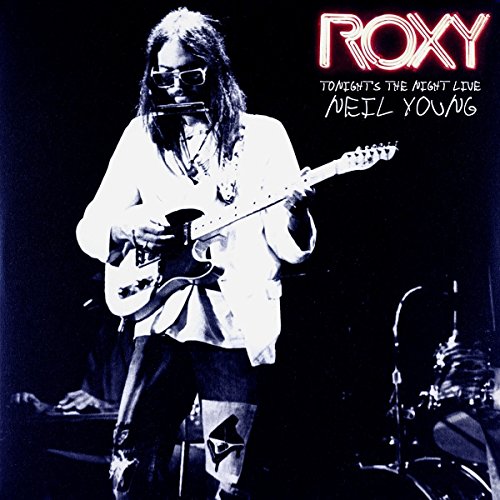 Neil Young playing guitar on album cover, black and white, "Roxy" text.