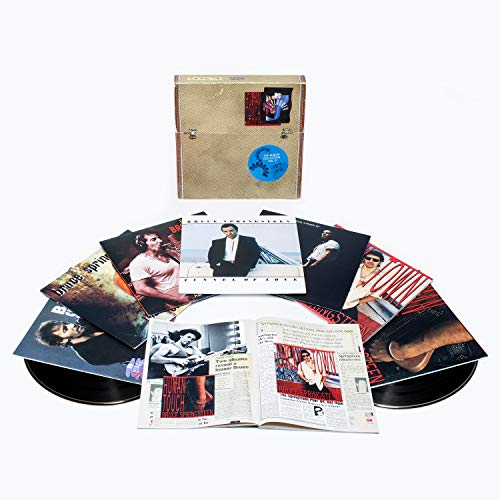 Bruce Springsteen vinyl collection in a tan box with album covers displayed.