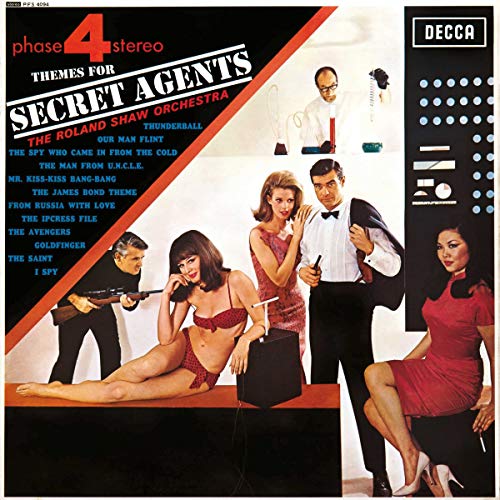 1960s album cover featuring people in spy-themed attire and poses.