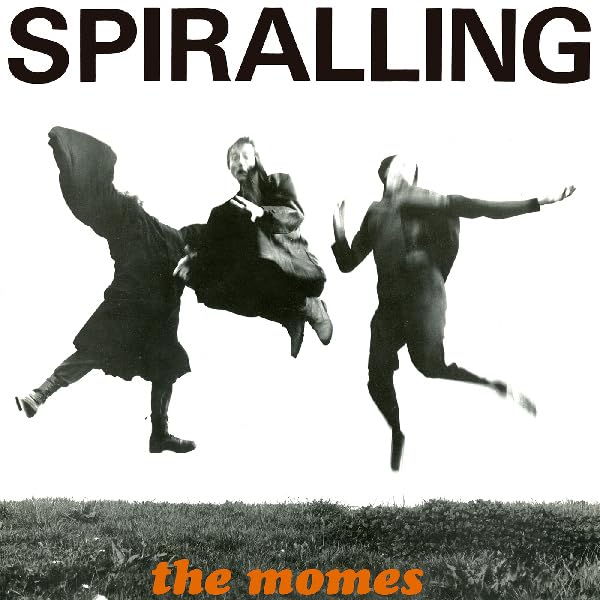 Vinyl record cover: black and white figures leaping over grass.