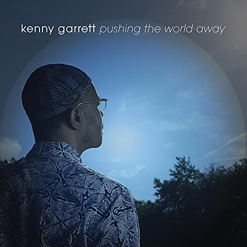 CD cover: man in patterned shirt looking at a blue sky.