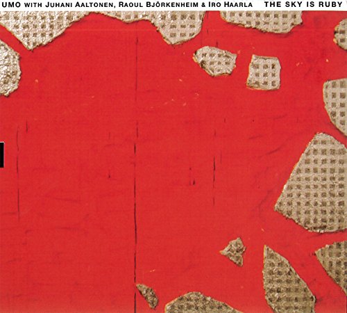 Red album cover with textured, torn paper and white grid patterns.