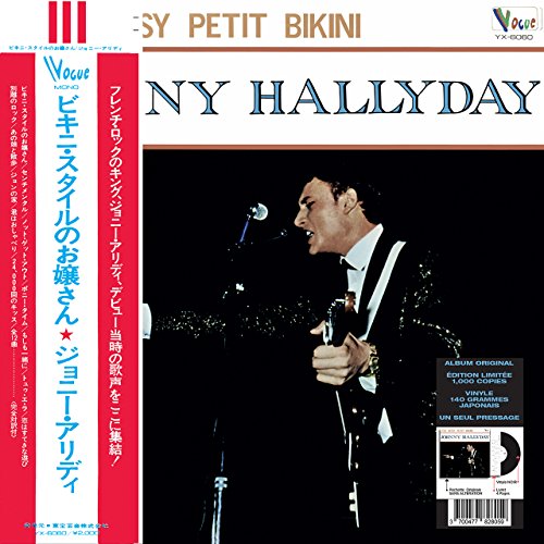 Johnny Hallyday vinyl record cover, portrait of a man in a suit.
