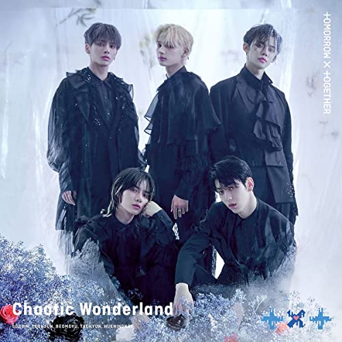 Tomorrow X Together album cover: five members in black, dreamy aesthetic.
