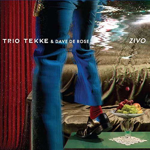 CD cover: legs in blue pants, red curtain, fruit, and a drink.