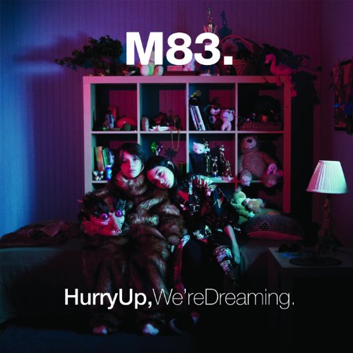 M83 album cover: people amongst toys in a dimly lit room.