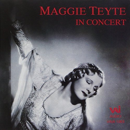 Black and white portrait of Maggie Teyte, a singer in performance attire.