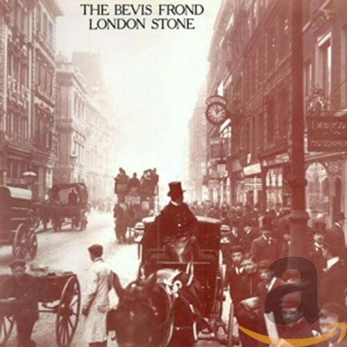 Sepia-toned image of a busy London street scene, horse-drawn carriages.