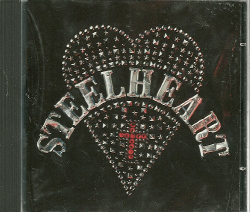 CD case with a black background and a studded heart design.