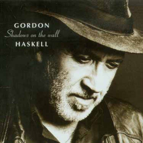 Black and white portrait of Gordon Haskell wearing a hat, album cover.
