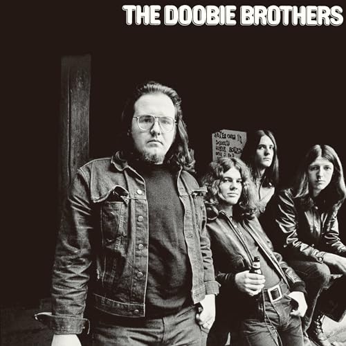 Black and white album cover featuring The Doobie Brothers band members.