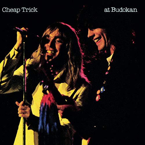 Album cover for Cheap Trick at Budokan, featuring two musicians performing.