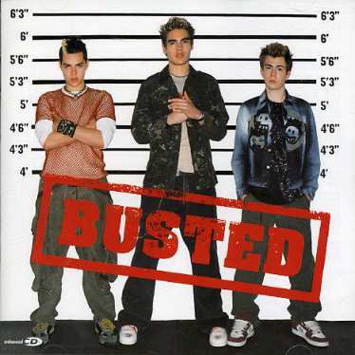 CD cover for Busted, featuring three young men in a mugshot style.