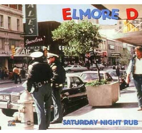 CD cover: street scene with two men in hats and cars.