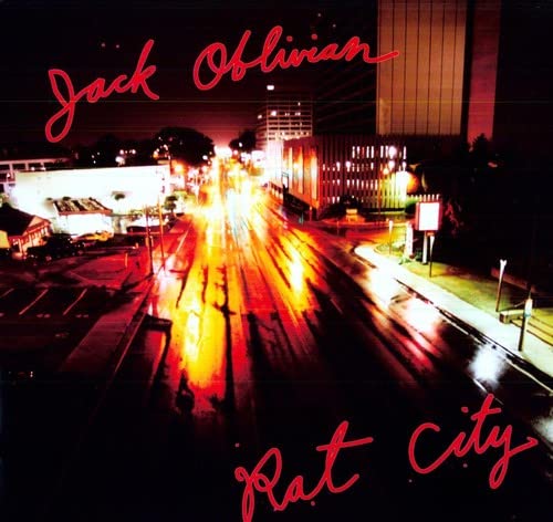 Night city street scene with red text: "Jack Oblivian" and "Rat City".