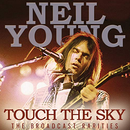 Neil Young album cover, "Touch The Sky," featuring a live performance photo.